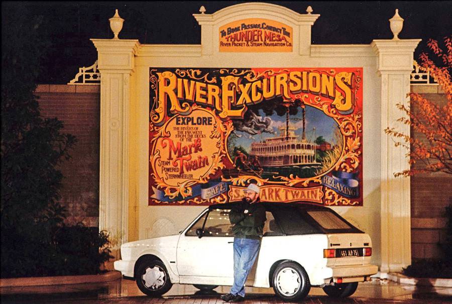 Main Street, USA. 3 AM photo shoot with Trickett & Webb. Craig standing in front of one of his signs.